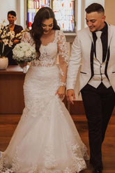 Elegante vestido de novia largo de sirena con encaje y espalda abierta con mangas