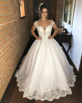 Elegante vestido de novia largo con apliques de princesa y encaje con escote en V