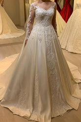 Elegante vestido de novia de satén perlado con apliques de corazón, manga larga y corte en A
