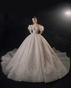 Luxurious Off-the-Shoulder Ball Gown Sweetheart Neckline Feather Trim Beaded Lace Wedding Dress with Glitter Train E-306 by ZAPDRESS