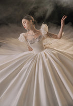 Regal Ball Gown Illusion Neckline Tulle Puff Sleeve Beaded Lace Wedding Dress with Oversized Bow Train E-304 by ZAPDRESS