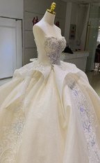 Ivory Glimmer Strapless Ballgown: Iridescent Beaded Bust & Flowing Train by ZAPDRESS