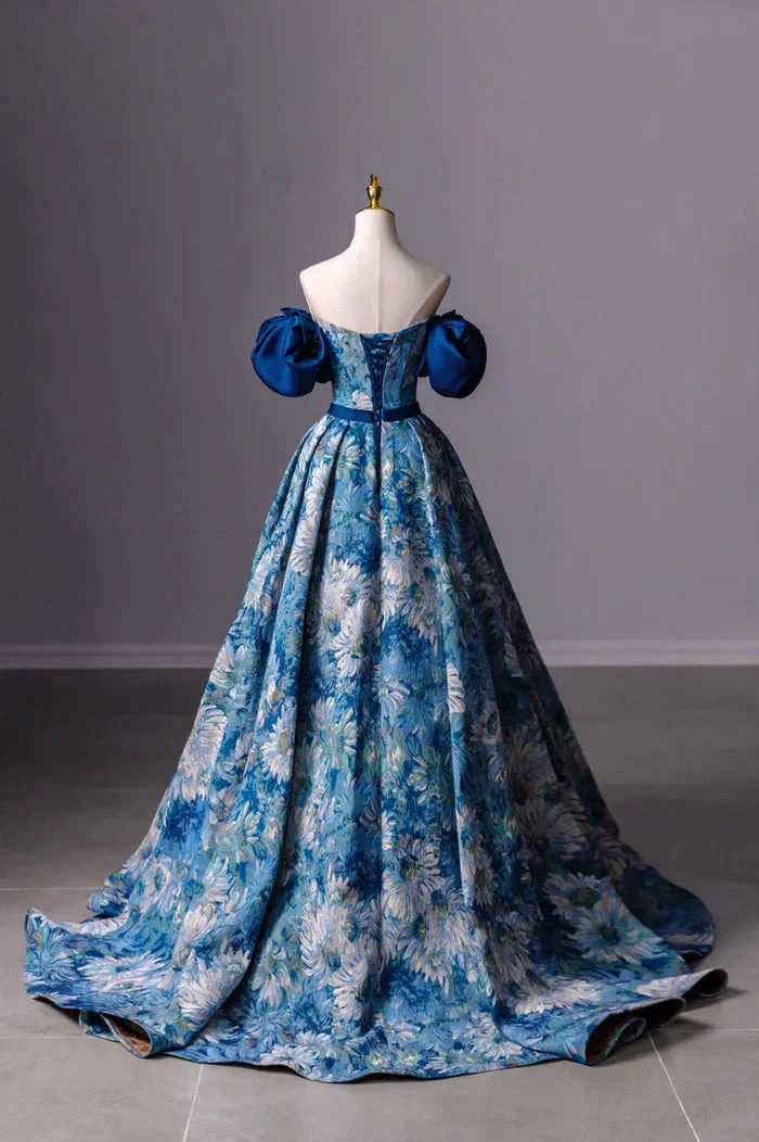 Blue floral ball gown with puff sleeves on mannequin, elegant fashion dress by ZAPDRESS