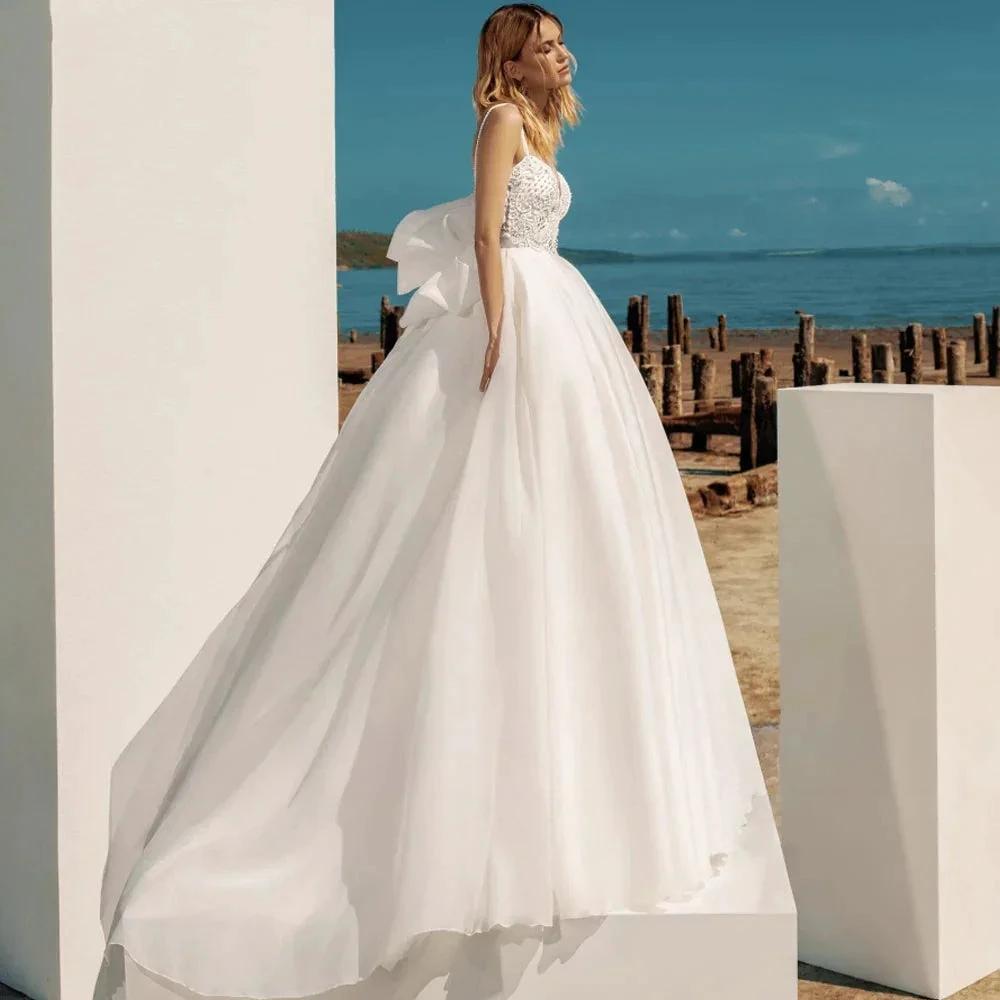 A-Line Bohemian Wedding Dresses Women's Sweetheart Spaghetti Strap Backless Vestido De Beaded Shiny Back Bowknot Robe De Mariee by payinti