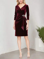 Short Velvet Sheath Dress with Surplice Neckline, Cascade Skirt and Embellishment Detail at Hip by Dreamylily