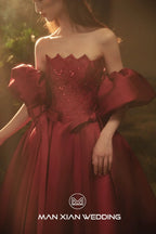 Opulent Burgundy Strapless Satin Ball Gown with Puff Sleeves & Sequin Bodice by ZAPDRESS