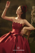 Opulent Burgundy Strapless Satin Ball Gown with Puff Sleeves & Sequin Bodice by ZAPDRESS