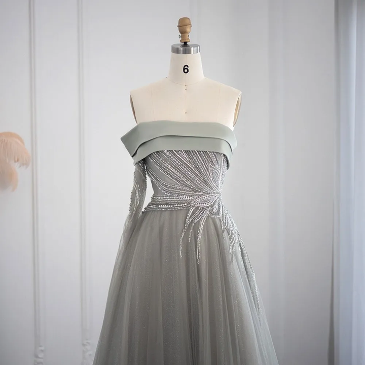Vestido de fiesta de diseñador con lentejuelas, mangas largas, hombros descubiertos y corte A
