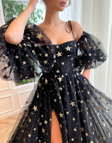 Tara | Vestido de fiesta negro con abertura lateral y estrellas