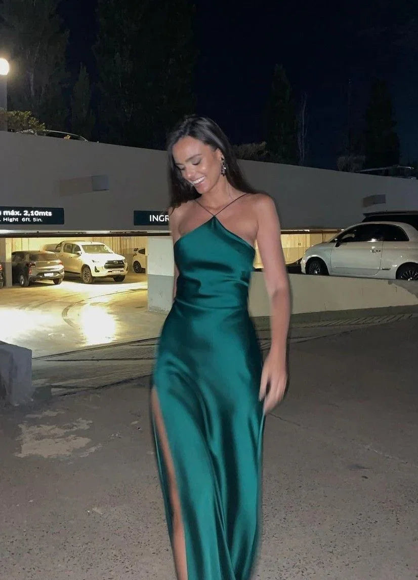 Woman in elegant green satin evening dress with a thigh-high slit, ZAPDRESS fashion