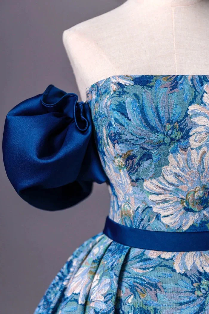 Floral blue dress on mannequin with bold satin puff sleeve, ZAPDRESS fashion design