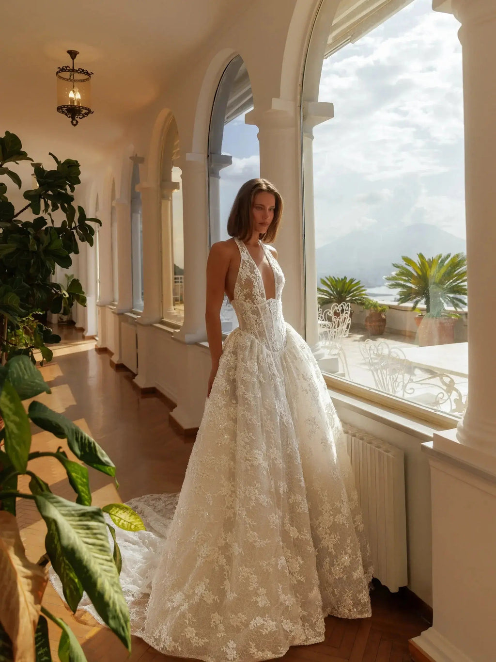 Modern Ivory Lace Deep V-Neck Halter Ball Gown Wedding Dress with Train SW185