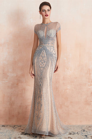 Glamoroso vestido de fiesta largo de sirena con cuentas y mangas cortas