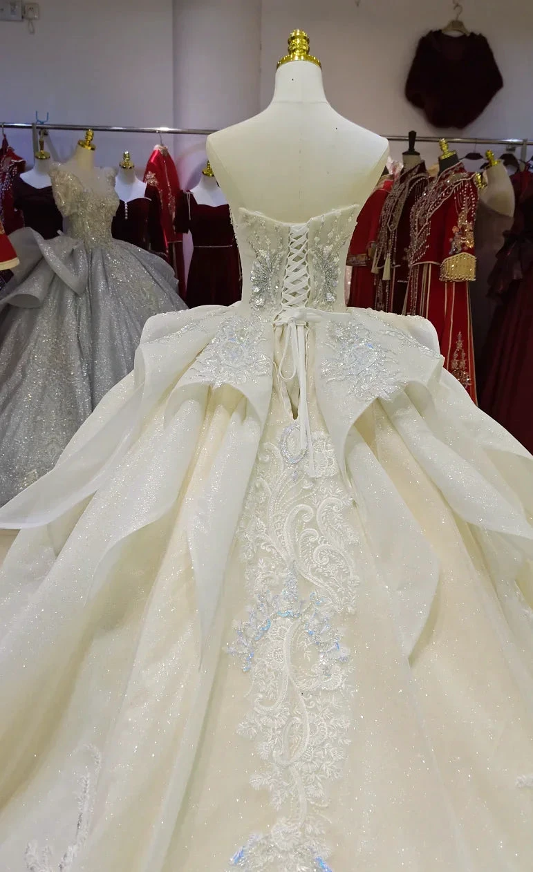 Ivory Glimmer Strapless Ballgown: Iridescent Beaded Bust & Flowing Train by ZAPDRESS
