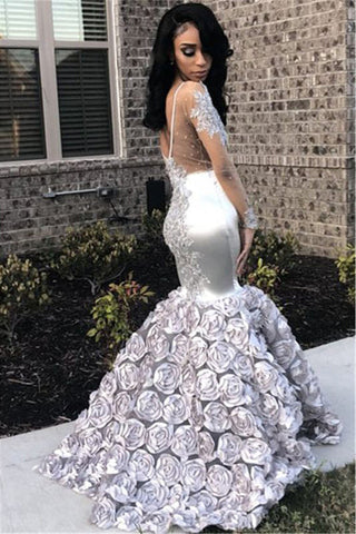 Königliches Ballkleid mit langen Ärmeln und aufwendigen Applikationsdetails