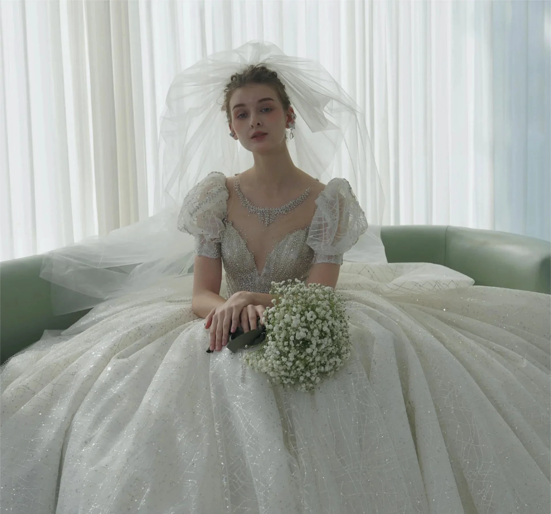 Glittering Ball Gown Deep V-Neck Tulle Wedding Dress with Beaded Embroidery &amp; Puff Sleeves 6021-1 by ZAPDRESS