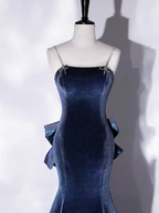 Elegant navy blue velvet dress with jeweled straps on mannequin at ZAPDRESS