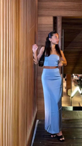 Woman in a light blue two-piece dress posing indoors, ZAPDRESS fashion style