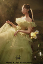 Ethereal Sage Green Off-Shoulder Tulle Ball Gown with Ruffled Sleeves & 3D Floral Accents by ZAPDRESS