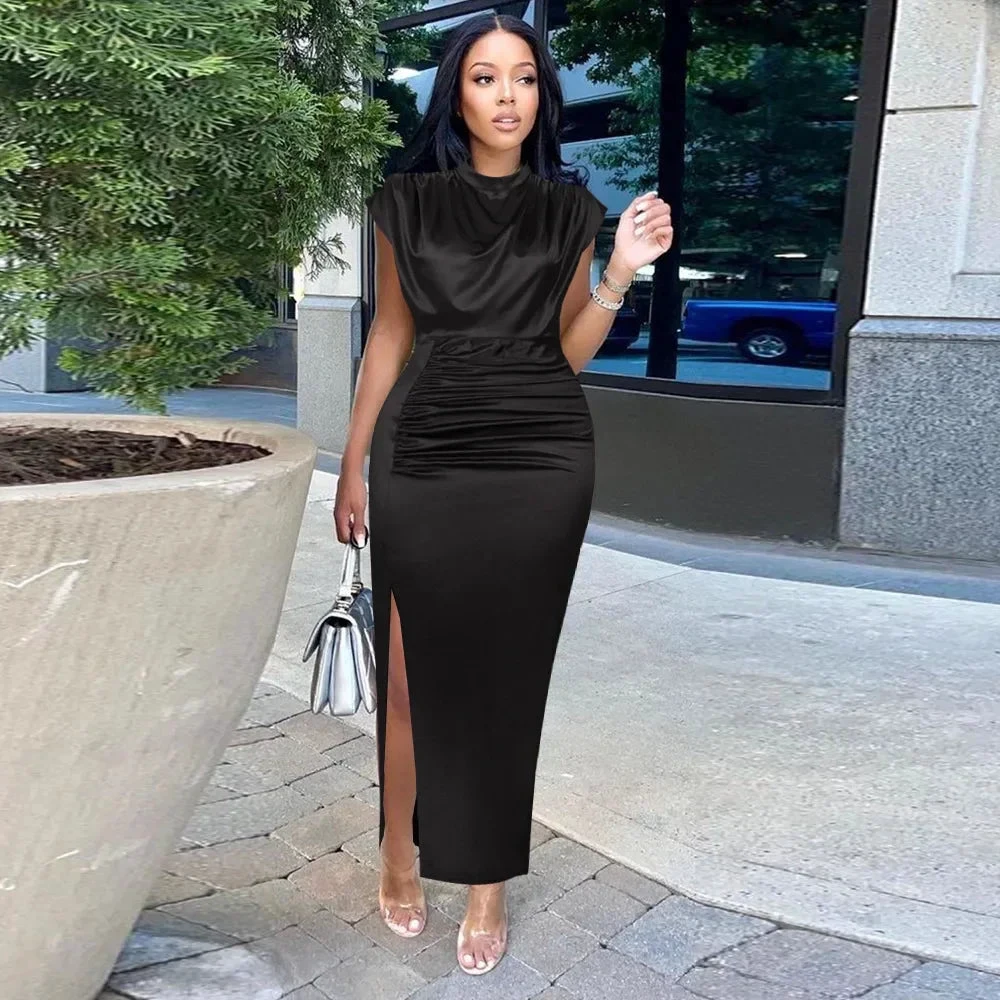 Woman modeling elegant black sleeveless maxi dress with side slit outdoors, ZAPDRESS fashion