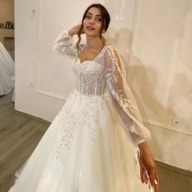 White Wedding Dresses Sweetheart Shiny Appliques Grace Bridal Gowns 2023 Puff Sleeve Tulle A-Line Princess Robe De Marié Main Image