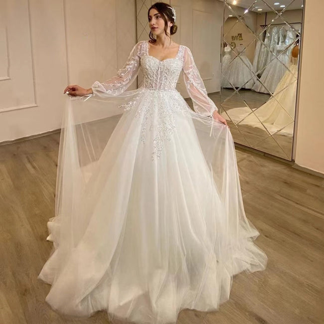 White Wedding Dresses Sweetheart Shiny Appliques Grace Bridal Gowns 2023 Puff Sleeve Tulle A-Line Princess Robe De Marié Hover Image