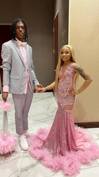 Couple in glamorous pink prom dress and light grey suit with pink accents, ZAPDRESS style