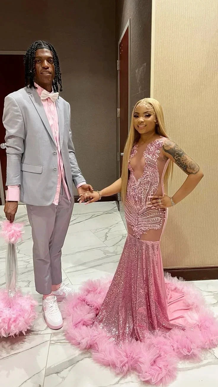 Couple in glamorous pink prom dress and light grey suit with pink accents, ZAPDRESS style