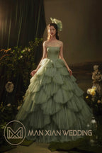 Ethereal Mint Green Tulle Ball Gown with Illusion Chain Shoulders & Tiered Ruffled Skirt by ZAPDRESS