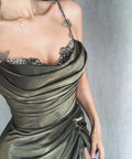 Elegant metallic draped dress with embellished straps from ZAPDRESS, close-up view