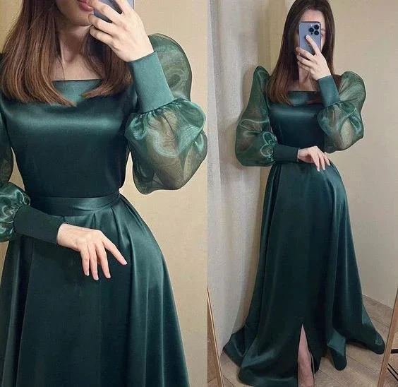 Woman wearing elegant dark green satin evening gown with sheer puff sleeves, ZAPDRESS fashion