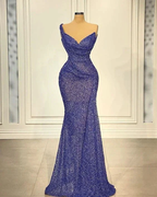 Elegant sparkly blue evening dress on mannequin, fitted gown by ZAPDRESS, showroom display