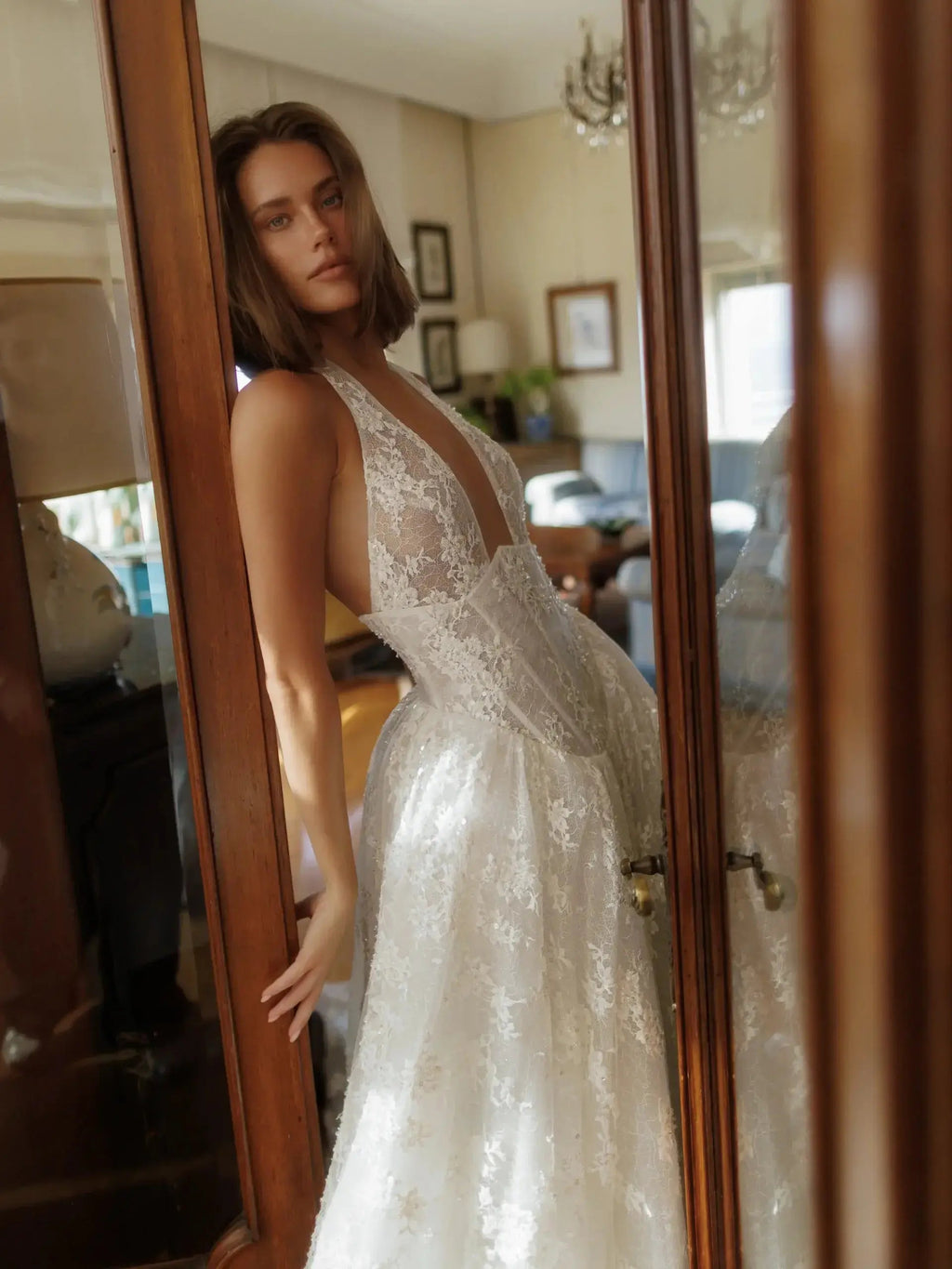 Modern Ivory Lace Deep V-Neck Halter Ball Gown Wedding Dress with Train SW185