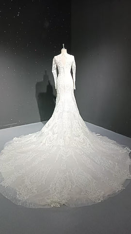 V-neck long sleeved luxurious nail bead trailing bridal veil