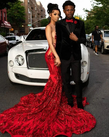 Elegant couple in formal evening wear posing by luxury white car, red sequin dress, ZAPDRESS style
