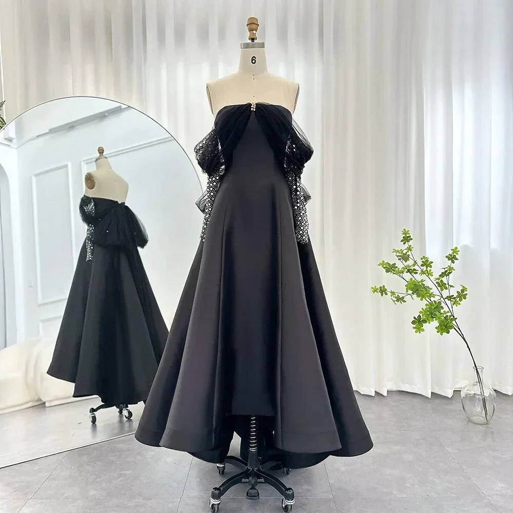 Elegant black strapless evening gown with mesh details on mannequin, ZAPDRESS fashion
