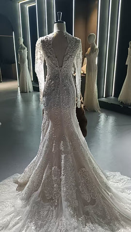 V-neck long sleeved luxurious nail bead trailing bridal veil