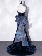 Elegant navy evening gown with silver bow and chain straps, displayed on mannequin, ZAPDRESS