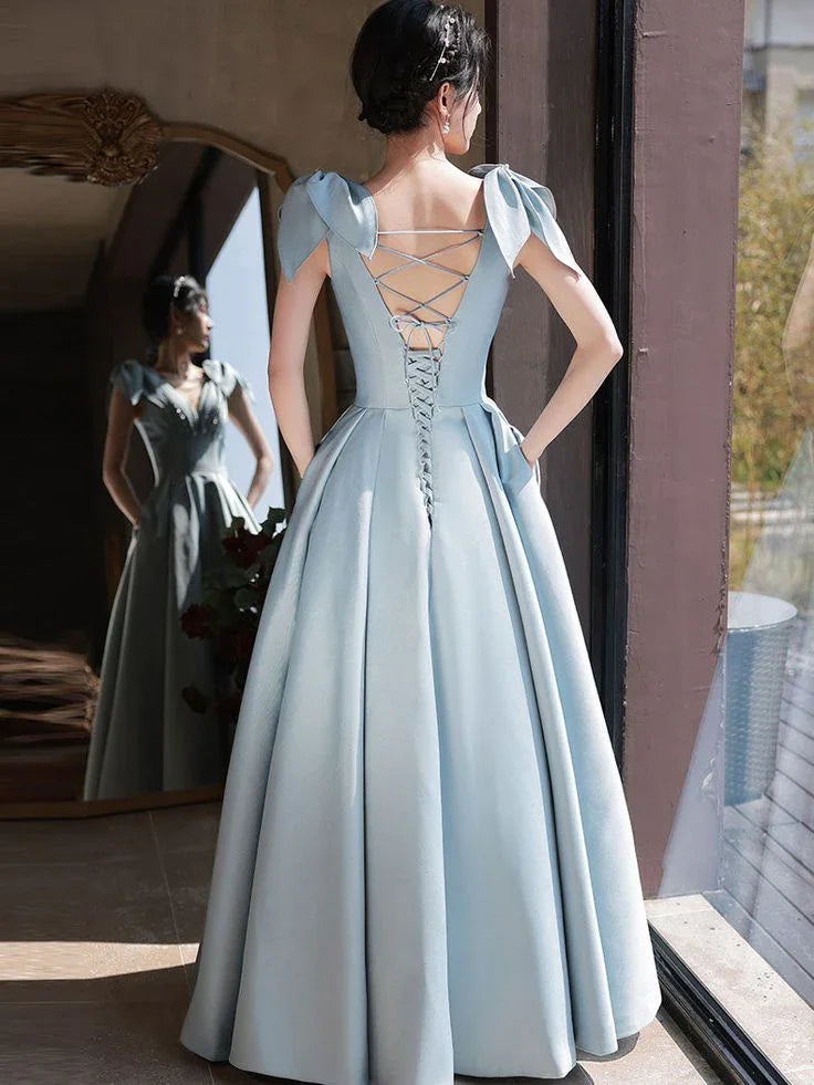 Elegant light blue evening gown with lace-up back and puff sleeves, ZAPDRESS fashion