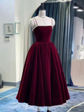 Elegant burgundy velvet midi dress with pearl trim on mannequin, ZAPDRESS boutique display