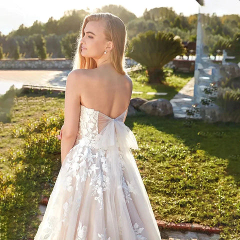 Strand Elfenbein Brautkleider für Frauen 2023 Sommer Sweetheart A-Linie Bodenlang Illusion Brautkleid Schleife Rücken Spitze Applikation 