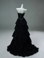 Black tiered evening gown on mannequin, ZAPDRESS formal fashion style
