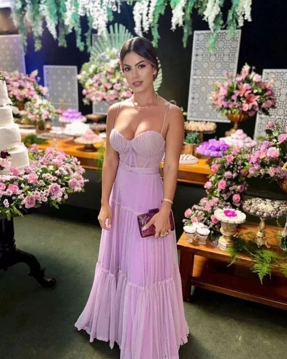 Woman in a lilac evening dress at an elegant floral event display, ZAPDRESS fashion