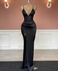 Elegant black evening gown with sequin bodice and thigh-high slit on mannequin, ZAPDRESS