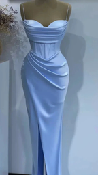 Elegant light blue satin evening dress on mannequin with draped bodice and high slit, ZAPDRESS