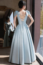 Elegant light blue evening gown with lace-up back and cap sleeves, ZAPDRESS fashion
