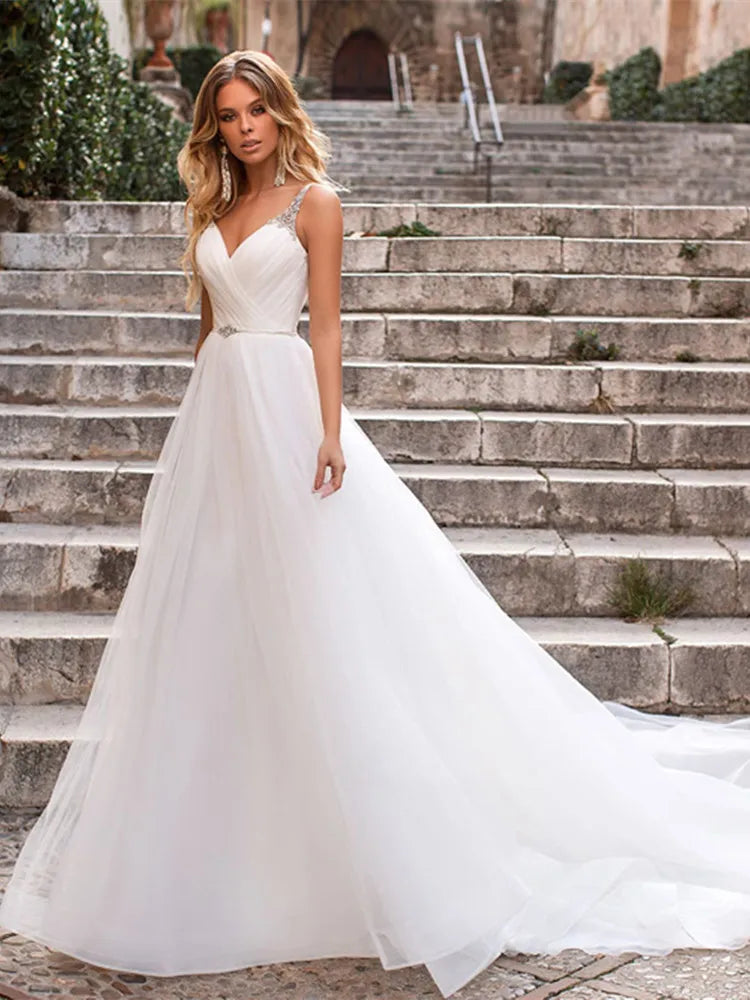 Elegant V Neck Spaghetti Strap Wedding Dresses 2022 New Arrival Beading Sleeveless Backless Bridal Gowns Sweep Train For Women