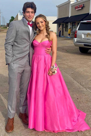Vestido de noche largo de satén fucsia sin tirantes y con bolsillos PSK432