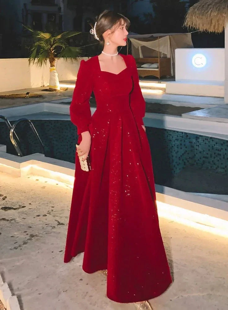 Woman in elegant red sequin evening gown by pool, ZAPDRESS fashion