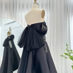 Elegant black strapless gown with tulle accents on mannequin, ZAPDRESS fashion display